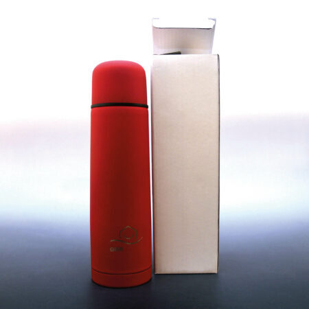 Thermoskanne mit Softtouch-Lackierung, rot in neutraler Umverpackung.